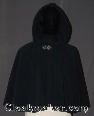 Cloak:3450, Cloak Style:Full Circle Cloak Short, Cloak Color:Navy Blue, Fiber / Weave:WindPro Fleece, Cloak Clasp:Triple Medallion, Hood Lining:Unlined faux shearling<br>interior double sided fabric, Back Length:21", Neck Length:21", Seasons:Winter, Southern Winter, Fall, Spring, Note:This navy blue windpro ruana cloak<br>will keep you warm and dry<br>on chilly nights.<br>Perfect for a child to grow with<br>or a warm shrug<br>for a night on the town.<br>This soft and cuddly cloak has an<br>interior faux shearling texture<br>for extra comfort and a water<br> resistant outer layer to keep<br> you dry during light rain/snow.<br>The silver-tone triple medallion clasp<br>is the final touch on this<br>functional and elegant cloak.<br>Machine washable<br>DO NOT DRY CLEAN..