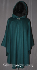Cloak:3482, Cloak Style:Shape Shoulder Ruana, Cloak Color:Forest Green, Fiber / Weave:70% wool, 20% cashmere,<br>10% nylon blend, Cloak Clasp:Vale, Hood Lining:Black Crushed Velvet, Back Length:43.5" back 27.5" side, Neck Length:21", Seasons:Southern Winter, Fall, Spring, Winter, Note:A woodland fairy tale piece<br>this classic shape shoulder ruana<br>is made of a wool blend<br>with a full-sized hood lined in a<br>black crushed velvet and<br>accented with a classic pewter vale<br>hook-and-eye clasp.<br>A cross between a cape and a cloak,<br>a ruana is a great way to keep warm<br>while frequent, unhindered use of<br>your arms is needed.<br>With an overarm of 27.5" this cloak<br>has less bulk than a<br>traditional Ruana and<br>makes a great driving cloak!<br>Spot or dry clean only<br>Can be hemmed to height..