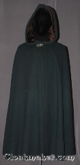 Cloak:3501, Cloak Style:Shaped Shoulder Cloak, Cloak Color:Forest Green, Fiber / Weave:80% wool, 20% nylon, Cloak Clasp:Vale, Hood Lining:Dark Brown Cotton Velvet, Back Length:43", Neck Length:21.5", Seasons:Winter, Southern Winter, Fall, Spring, Note:A classic woodland piece.<br>This full circle forest green cloak<br>is made of a wool blend with a<br>purple velveteen hood lining.<br>Adorned with a vale hook and eye clasp.<br>Spot or dryclean only<br>Can be hemmed to height..