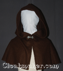 Cloak:3531, Cloak Style:True Half Circle Capelet<br>short/youth, Cloak Color:Milk Chocolate Brown, Fiber / Weave:100% Wool, Cloak Clasp:Alpine Knot - Silvertone, Hood Lining:Unlined, Back Length:14.5", Neck Length:21", Seasons:Winter, Southern Winter, Fall, Spring, Note:This beautiful short capelet<br>is a perfect starter cloak<br>Made from 100% wool this small<br>milk chocolate brown fits children and adults.<br>Spot or dryclean only..