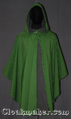 Cloak:3533, Cloak Style:Shape shoulder Ruana raincoat, Cloak Color:Green checkered texture, Fiber / Weave:3 layer ultrex, Cloak Clasp:Vale, Hood Lining:Unlined grey fleece interior, Back Length:40.5" L<br>26" side, Neck Length:19", Seasons:Southern Winter, Fall, Spring, Note:You will be singing in the rain on your way<br>to school or hiking in this<br>water proof ultrex ruana<br>The 3 layered fabric has a green<br>crosshatched outer lining and an<br>absorbent grey fleece interior, with<br>a thin wind blocking material in between<br>The added pleat in back allows for you<br>and your supplies to travel underneath<br>your cloak's protection for your comfort.<br>A cross between a cape and a cloak<br>,a ruana is a great way to keep warm<br>when frequent, unhindered<br>use of your arms is needed.<br>Ruanas make great driving cloaks!<br>Machine wash cold..