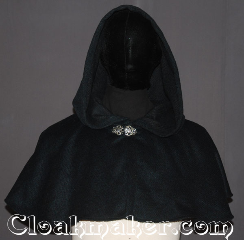Cloak:3534, Cloak Style:Shape shoulder short capelet, Cloak Color:Navy Blue Heathered<br>with cobalt and green, Fiber / Weave:100% Wool Melton, Cloak Clasp:Vale, Hood Lining:Unlined, Back Length:12.75", Neck Length:23", Seasons:Southern Winter, Fall, Spring, Note:The pictures do not do this cloak justice.<br>A shape shoulder short capelet,<br>A perfect starter cloak for an adult or child<br>Made from a gorgeous navy blue wool blend<br>heathered with jewel tone blues and greens<br>adorned with a classic vale hook-and-eye clasp.<br>Spot or Dry Clean Only..