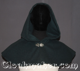 Cloak:3535, Cloak Style:Shape shoulder short capelet, Cloak Color:Forest green, Fiber / Weave:100% Wool Melton, Cloak Clasp:Vale, Hood Lining:Unlined, Back Length:8.75", Neck Length:21", Seasons:Winter, Southern Winter, Fall, Spring, Note:Ready to rob the rich?<br>This shape shoulder short capelet is a<br>perfect starter cloak for an adult or child<br>Made from a dark forest green wool blend<br>adorned with a classic vale hook-and-eye clasp.<br>Spot or Dry Clean Only..