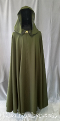 Cloak:3577, Cloak Style:Full Circle Cloak, Cloak Color:Pine Green, Fiber / Weave:Polyester Suiting, Cloak Clasp:Vale, Hood Lining:Unlined, Back Length:54", Neck Length:23", Seasons:Spring, Fall, Summer, Note:This dark pine green full circle cloak<br>has a slight stretch to the fabric and<br>is lightweight in both flow and feel.<br>Perfect for cool evenings or an accent<br>to that outfit or costume.<br>Finished with grosgrain ribbon<br>for a professional look.<br>Closure is a silvertone vale clasp.<br>Best of all machine washable..