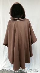 Cloak:3614, Cloak Style:Ruana, Cloak Color:Khaki Brown, Fiber / Weave:100% wool doublecloth, Cloak Clasp:Vale, Hood Lining:Brown Velvet, Back Length:44", Neck Length:23", Seasons:Winter, Southern Winter, Spring, Fall, Note:Why wear a trenchcoat when you can<br>really make a style statement.<br>This khaki brown ruana cloak<br>made with wool doublecloth is just<br>the impression you want to make.<br>Short on the sides, so you can navigate<br>the turnstiles of your busy life,<br>with a dark brown velvet hood to<br>keep out the weather.<br>Dry clean only..