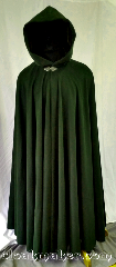 Cloak:3624, Cloak Style:Full Circle Cloak, Cloak Color:Deep Mossy Hunter Green, Fiber / Weave:100% Brushed Wool Coating, Cloak Clasp:Triple Medallion, Hood Lining:Brown polyester Velvet, Back Length:59", Neck Length:24", Seasons:Southern Winter, Spring, Fall, Note:This full circle cloak is a beautiful deep<br>mossy hunter green color with a<br> brown polyester velvet hood lining.<br>Like the shadows lining the<br>undersides of forest trees.<br>This cloak is longer than what we<br>usually keep in stock, if you are<br>in need of a cloak with<br>extra height get it quick!<br>Dry clean only..