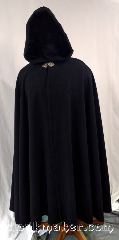 Cloak:3629, Cloak Style:Full Circle Cloak, Cloak Color:Black, Fiber / Weave:100% Wool, Cloak Clasp:Triple Medallion, Hood Lining:Dark Green Rayon Velvet, Back Length:51", Neck Length:24", Seasons:Southern Winter, Spring, Fall, Note:This full circle cloak is perfect<br>for adding just a touch of<br>drama and elegance.<br>Made of soft, breathable 100% wool<br>with a dark emerald green<br>rayon velvet hood lining<br>and finished with a pewter clasp.<br>Dry clean only..