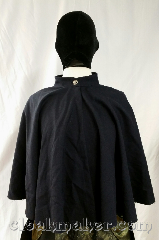 Cloak:3649, Cloak Style:Full Circle Cloak, Cloak Color:Dark Navy Blue, Fiber / Weave:100% wool, Cloak Clasp:Button, Hood Lining:N/A, Back Length:21", Neck Length:20", Seasons:Spring, Summer, Fall, Note:A sweet little navy blue cloak<br>without a hood, has a pretty<br>silvertone triscal button.<br>100% wool, dry clean only..