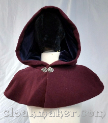 Cloak:3687, Cloak Style:Shaped Shoulder Cloak, Cloak Color:Heathered Wine Red, Fiber / Weave:80% wool, 20% nylon, Cloak Clasp:Vale, Hood Lining:Navy velvet, Back Length:10", Neck Length:23", Seasons:Winter, Southern Winter, Fall, Spring, Note:Heathered wine colored shaped shoulder<br>cloak with a navy velvet hood lining.<br>Features a silvertone vale clasp closure.<br>Wool blend, dry clean only..