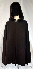 Cloak:3704, Cloak Style:Shaped Shoulder Cloak, Cloak Color:Brown novelty weave, Fiber / Weave:80% wool, 20% nylon, Cloak Clasp:Vale, Hood Lining:Brown rayon velvet, Back Length:36", Neck Length:21", Seasons:Spring, Fall, Note:A shaped shoulder cloak made from a<br>brown novelty weave wool blend fabric.<br>Has a very soft brown rayon<br>velvet hood liner and a<br>silvertone vale clasp.<br>Dry clean only..