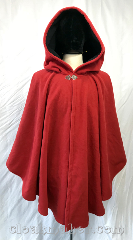 Cloak:3742, Cloak Style:Cape / Ruana, Cloak Color:Bright Cherry Red, Fiber / Weave:WindBloc Fleece, Cloak Clasp:Vale, Hood Lining:Self lined wiith Dark charcoal, Back Length:38", Neck Length:23", Seasons:Winter, Southern Winter, Spring, Fall, Note:Windbloc fleece in a bright cherry red<br>will keep the wind off your back.<br>Self lined in a dark charcoal,<br>this water resistant ruana style cloak<br>has a silvertone vale clasp<br>to keep you safe and secure..