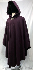 Cloak:3764, Cloak Style:Shaped Shoulder Cloak, Cloak Color:Plum Purple, Fiber / Weave:80% wool, 20% nylon, Cloak Clasp:Triple Medallion, Hood Lining:Black Velvet, Back Length:45.5", Neck Length:25", Seasons:Southern Winter, Spring, Fall, Note:A deep dusty purple shaped shoulder<br>ruana style cloak in semi felted<br>wool melton with a black velvet hood lining.<br>This cloak is a good winter weight<br>with some wind resistance.<br>Made from a wool blend, dry clean only..
