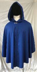 Cloak:3787, Cloak Style:Shaped Shoulder Ruana, Cloak Color:Cobalt Blue, Fiber / Weave:80% wool, 20% nylon, Cloak Clasp:Vale, Hood Lining:Cobalt blue cotton velveteen, Back Length:39", Neck Length:24", Seasons:Southern Winter, Spring, Fall, Note:A stunning cobalt blue shaped shoulder<br>ruana style cloak in a luxurious<br>wool blend.<br>Adorned with a silvertone<br>vale clasp and a cobalt blue<br>cotton velveteen hood lining.<br>Dry clean only..