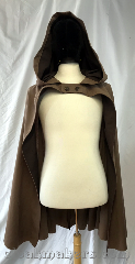 Cloak:3792, Cloak Style:Hobbit style, Cloak Color:Sandy brown, Fiber / Weave:100% wool, Cloak Clasp:2 leaf buttons, Hood Lining:Chocolate brown wool twill, Back Length:38", Neck Length:20", Seasons:Summer, Fall, Spring, Note:Held in place by two leaf buttons,<br>this Hobbit style cloak is<br>made from sandy brown<br>colored 100% wool fabric.<br>It has a chocolate brown<br>wool twill hood lining<br>and is dry clean only..