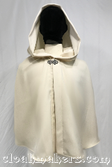 Cloak:3815, Cloak Style:Shaped Shoulder Cloak, Cloak Color:Ivory Cream, Fiber / Weave:Polyester, Cloak Clasp:Vale, Hood Lining:unlined, Back Length:23", Neck Length:18", Seasons:Fall, Spring, Summer, Note:Whether it's wedding season or<br>you're just looking for something soft<br>and lightweight for summer,<br>you can't go wrong with this<br>shaped shoulder cloak.<br>Made from ivory cream colored<br>polyester and finished with a<br>silvertone vale clasp.<br>Machine washable!.