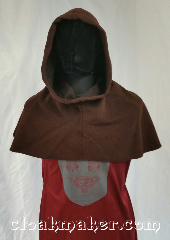 Cloak:H111, Cloak Style:Regular Hood, Cloak Color:Brown, Fiber / Weave:Wool blend, Hood Lining:Unlined, Back Length:9", Neck Length:L - neck 26", Seasons:Spring, Fall, Winter, Note:This hood is a heathered brown<br>with some black.<br>Wool blend, dry clean only.<br>26"neck hole.<br>Pictured on tunic J561<br>Tunic not included..