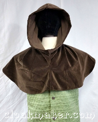 Cloak:H134, Cloak Style:Regular Hood, Cloak Color:Mushroom brown, Fiber / Weave:Velveteen, Hood Lining:unlined, Back Length:10", Neck Length:L - neck 26", Seasons:Spring, Summer, Fall, Note:This hood is made from a mushroom<br>brown velveteen material.<br>Machine wash cold on<br>delicate cycle, hang to dry.<br>Pictured on tunic J570,<br>tunic not included..