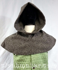 Cloak:H136, Cloak Style:long point, Cloak Color:Basket weave grey, tan, black, Fiber / Weave:100% wool, Hood Lining:unlined, Back Length:11", Neck Length:L - neck 26", Seasons:Spring, Fall, Note:This hood is made from 100% wool<br>in a basket weave grey, tan,<br>black, verigated colors.<br>It has a pointy style hood.<br>Dry clean only. 26" neck hole.<br>Pictured on tunic J570,<br> tunic not included..