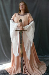 Gown ID:G537, Gown Color:Peach, Style:12th Century, Sleeve:Long Drop Sleeve in white cotton, Trim:Celtic Knot at bicep, Neckline Type:Squared Sweetheart, Fabric:Linen, Sleeve Length:32.5", Back Length:59".