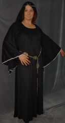 Gown ID:G621, Gown Color:Black, Style:12th Century, Sleeve:Long drop sleeve, Trim:silver lace trim at edge, Neckline Type:Ballet, Fabric:sueded polyester moleskin, Sleeve Length:31", Back Length:58".