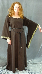 Gown ID:G653, Gown Color:Brown, Style:12th Century, Sleeve:Long drop sleeve, Trim:Cross trim at sleeve edge, Neckline Type:Ballet, Fabric:Washed Worsted Wool Crepe, Sleeve Length:28.5", Back Length:56.5".
