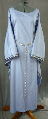 Gown ID:G669, Gown Color:Cornflower Blue, Style:12th Century, Sleeve:Long Drop Sleeve with 2-Tone Blue Floral trim at edge, Trim:2-Tone Blue Floral, Neckline Type:Wide Portrait Neck, Fabric:Cotton Twill, Sleeve Length:33", Back Length:56".
