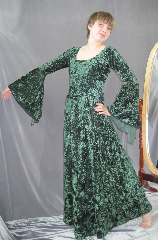 Gown ID:G672, Gown Color:Green, Style:12th Century, Sleeve:Long Drop Sleeve with black lace at edge, Trim:Black lace at sleeve edge, Neckline Type:Ballet, Fabric:Crushed Velvet, Sleeve Length:30", Back Length:55".