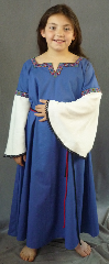 Gown ID:G678, Gown Color:Blue, Style:12th Century, Sleeve:Long Drop Sleeve in cream cotton with Fantasia (Purple/Teal) at bicep and small black lace at end, Trim:Fantasia, Purple/Teal at neck and bicep, Neckline Type:Squared Keyhole with  Purple/Teal Fantasia trim, Fabric:Cotton with Rayon Sleeves, Sleeve Length:25", Back Length:43".