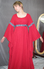 Gown ID:G703, Gown Color:Red - comes with matching removeable, adjustable  trim belt, Style:12th Century, Sleeve:Long Drop Sleeve with Florentine Wide (silver blue & red) trim at bicep, Trim:Florentine Wide (silver blue & red) at bicep, and on belt (included), Neckline Type:Ballet, Fabric:Washed Linen, Sleeve Length:30", Back Length:58".