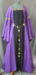 Gown ID:G708, Gown Color:Purple with a black front panel, Style:12th Century, Sleeve:Long Drop Sleeves with Medallian wide trim at biceps and narrow black lace at wrist, Trim:Medallian wide trim at biceps and narrow black lace at wrist, Neckline Type:Square trimmed in Medallion wide trim, Fabric:Linen, Sleeve Length:32", Back Length:61".