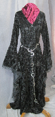 Gown ID:G715, Gown Color:Black, Style:12th Century, Sleeve:Long Drop Sleeve with black gothic lace at edge, Trim:Black Gothic lace at sleeve edge, Neckline Type:Deep V neck, Fabric:Crushed Velvet, Sleeve Length:31", Back Length:57".