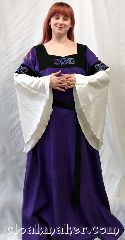 Gown ID:G969, Gown Color:Purple with black collar, Style:12th Century<br>Three shades of purple,<br>moon embroidery, Sleeve:White drapey sleeves<br>matching inset fabric<br>w/ moon embroidery, Trim:none, Neckline Type:square sweetheart, Fabric:100% linen, Sleeve Length:32.5", Back Length:57".