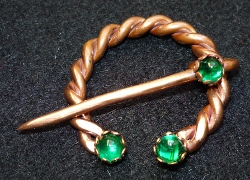 Copper twist with green stones Penannular
