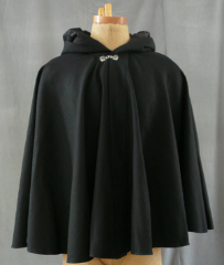 Cloak:1720, Cloak Style:Full Circle Cloak, Cloak Color:Black, Fiber / Weave:Med Wt Washed Wool Twill, Cloak Clasp:Alpine Knot - Silvertone, Hood Lining:Black Embossed Poly Moleskin, Back Length:30", Neck Length:20", Seasons:Summer, Fall, Spring.