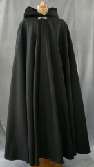 Cloak:1723, Cloak Style:Full Circle Cloak, Cloak Color:Black, Fiber / Weave:Heavy Felted Wool Melton, Cloak Clasp:Nordic Shield, Hood Lining:Black Flocked Polyester, Back Length:55", Neck Length:19", Seasons:Winter, Fall, Spring.