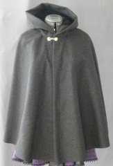 Cloak:1824, Cloak Style:Shaped Shoulder-Short Cloak, Cloak Color:Dark Heathered Grey, Fiber / Weave:Merino Wool, Cloak Clasp:Dragon Knot, Hood Lining:Black Cotton Velvet, Back Length:27", Neck Length:20", Seasons:Winter, Fall, Spring.