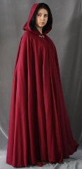 Cloak:1855, Cloak Style:Full Circle Cloak, Cloak Color:Maroon, Fiber / Weave:Fine Italian Wool Gabardine, Cloak Clasp:Triple Medallion, Hood Lining:Black Cotton Velvet, Back Length:58", Neck Length:19", Seasons:Spring, Fall, Winter.