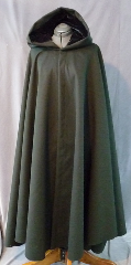 Cloak:1953, Cloak Style:Full Circle Cloak, Cloak Color:Dark Green, Fiber / Weave:Wool / cashmere, Cloak Clasp:Thimbleberry - Patinated single hook, Hood Lining:Black polyester triple velvet, Back Length:52", Neck Length:22", Seasons:Winter, Fall, Spring.