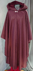 Cloak:2014, Cloak Style:Cape / Ruana, Cloak Color:Burgundy, Fiber / Weave:100% camel hair, Cloak Clasp:Fleur de Lis, Hood Lining:Dark Burgundy Cotton Velveteen, Back Length:47", Neck Length:21.5", Seasons:Winter, Fall, Spring.