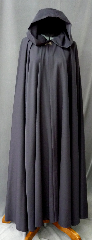 Cloak:2207, Cloak Style:Full Circle Cloak, Cloak Color:Charcoal grey, Fiber / Weave:Worsted wool Gabardine, Cloak Clasp:Antiquity, Hood Lining:Unlined, Back Length:55", Neck Length:19", Seasons:Fall, Spring, Southern Winter.