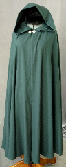 Cloak:2259, Cloak Style:Fuller Half circle, Cloak Color:Dark Green, Fiber / Weave:Tropical Weight Wool suiting, Cloak Clasp:Alpine Knot - Silvertone, Hood Lining:Unlined, Back Length:52", Neck Length:21", Seasons:Summer, Spring, Fall.