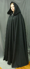 Cloak:2546, Cloak Style:Full Circle Cloak, Cloak Color:Black, Fiber / Weave:Wool Melton, Cloak Clasp:Triple Medallion, Hood Lining:Unlined, Back Length:59", Neck Length:25.5", Seasons:Winter, Fall, Spring.