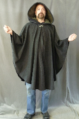 Cloak:2597, Cloak Style:Cape / Ruana, Cloak Color:Charcoal Grey, Fiber / Weave:80% Wool / 20% Nylon, Cloak Clasp:Vale, Hood Lining:Dark Dusty Olive Moleskin, Back Length:45", Neck Length:23", Seasons:Winter, Fall, Spring.