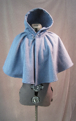 Cloak:2617, Cloak Style:Full Circle Short Cloak, Cloak Color:Colonial Blue, Fiber / Weave:WindPro Herringbone Fleece (wool-like exterior), Cloak Clasp:Plain Rope<br>Hook & Eye, Hood Lining:Self-lining, Back Length:20", Neck Length:19", Seasons:Winter, Fall, Spring.