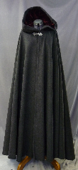 Cloak:2636, Cloak Style:Full Circle Cloak, Cloak Color:Dark Charcoal Grey, Fiber / Weave:80% Wool / 20% Nylon, Cloak Clasp:Gothic Heart, Hood Lining:Dark Red (Almost Black) Silk Velvet, Back Length:57", Neck Length:22", Seasons:Winter, Fall, Spring, Note:Dry Clean only.