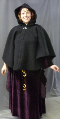 Cloak:2645, Cloak Style:Cape / Ruana extra long (21") over the shoulder, Cloak Color:Black, Fiber / Weave:Heavy Wool Melton, Cloak Clasp:Vale, Hood Lining:Unlined, Back Length:28", Neck Length:21", Seasons:Winter, Fall, Spring.