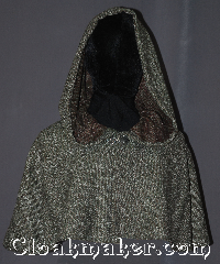 Cloak:3379, Cloak Style:Shaped Shoulder-Short (youth), Cloak Color:Green, white, red, brown black Boucle, Fiber / Weave:80% Wool / 20% Nylon, Cloak Clasp:Vale, Hood Lining:Unlined, Back Length:14.5", Neck Length:19.75", Seasons:Fall, Spring, Note:Become invisible in the dense forests<br>of Araluen with this one of a kind<br>shape shoulder capelet Green, white,<br>red, brown black boucle cloak.<br>The pride of any youth Ranger's Apprentice.<br>Adorned with a silver tone Vale clasp.<br>Dry clean only..