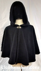 Cloak:3696, Cloak Style:Shaped Shoulder Cloak, Cloak Color:Black, Fiber / Weave:Windbloc Fleece, Cloak Clasp:Vale, Hood Lining:unlined, Back Length:25", Neck Length:22", Seasons:Winter, Southern Winter, Fall, Spring, Note:A black fleece shaped shoulder cloak<br>with a silvertone clasp.<br>Made from a wind blocking material,<br>machine wash cold using mild<br>detergent and tumble dry on low..