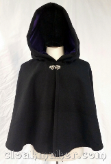 Cloak:3727, Cloak Style:Shaped Shoulder Cloak, Cloak Color:Black, Fiber / Weave:80% wool, 20% nylon, Cloak Clasp:Vale, Hood Lining:Purple stretch polyester velvet, Back Length:23.5", Neck Length:21", Seasons:Winter, Southern Winter, Fall, Spring, Note:With hidden inner pockets,<br>a silvertone vale clasp<br>and a rich purple stretch polyester<br>velvet hood lining,<br>this shaped shoulder cloak<br>is full of surprises.<br>Made from a black wool blend,<br>spot or dry clean only..