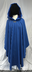 Cloak:3825, Cloak Style:Ruana, Cloak Color:Sapphire Blue, Fiber / Weave:80% wool, 20% nylon, Cloak Clasp:Vale, Hood Lining:Royal velvet, Back Length:43", Neck Length:22", Seasons:Southern Winter, Fall, Spring, Note:30" from neck to side, this<br>sapphire blue ruana style cloak<br>is made from a wool blend and has<br>a royal blue velvet hood lining..